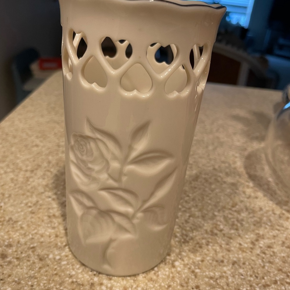 Lenox vase.Delightful 5 3/4"H vase w/rose design,gold trim,openwork upper part.